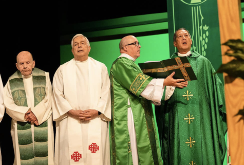 Bishop Oscar Solis celebrates mass at Septembers Centennial celebration. Msgr. Fitzgerald (far left) and Msgr. Mayo (second from left) are Judge graduates.