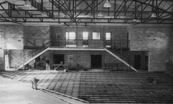 Construction on the gym floor in the early '50s. The gym is now named after Jim Yerkovich who coached the boys basketball teamms for 44 years.