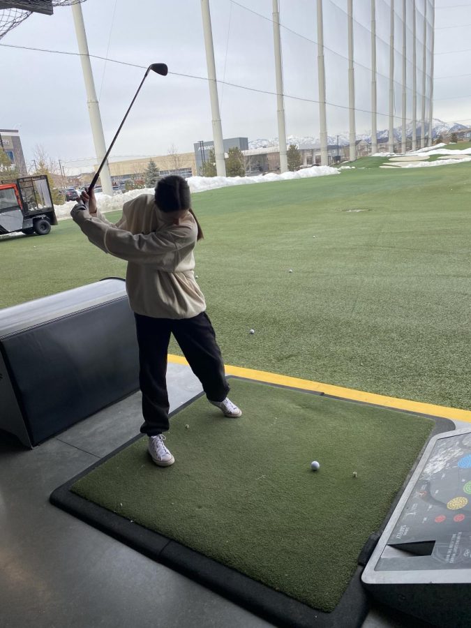 As of mid-April the girls golf team has only had one match. Instead they've been practicing their drives at Top Golf