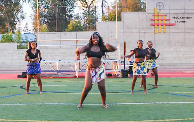 Members of the East High School BSU dance at the Judge Black to School night.