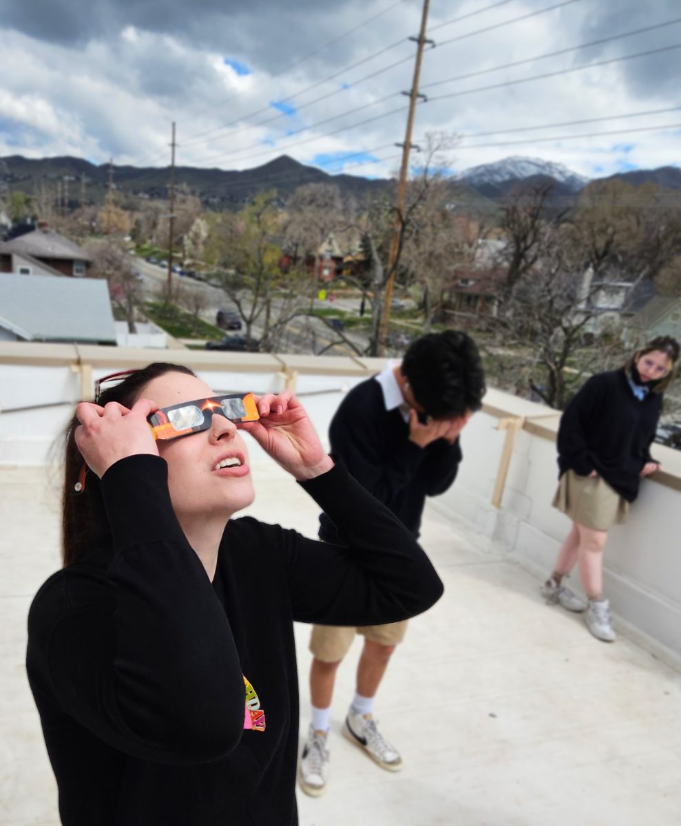 Ms. Sobotka and her AP Art students viewed the April 8 partial eclipse from the roof of the school.