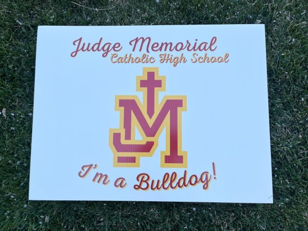 This year’s signs had a white background with the Judge logo in the center.