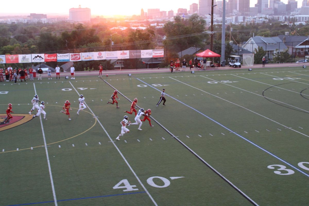 The sunset over the football field during the Homecoming football game.