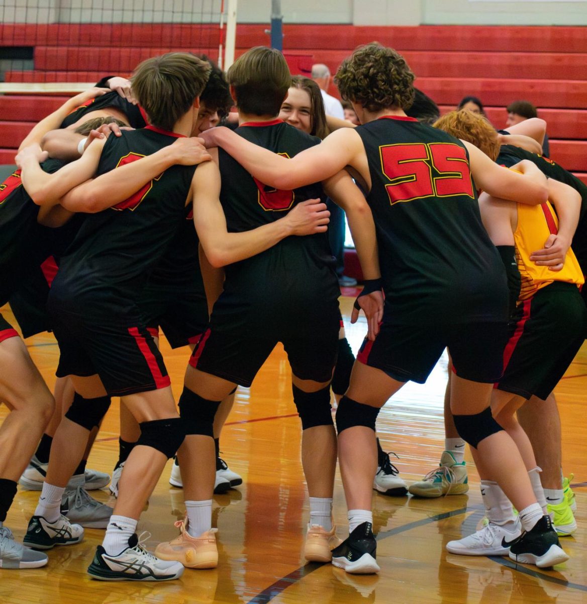 The boys volleyball team prepares for their game against Juan Diego on April 17.