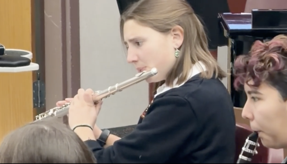 Katie Ross plays flute at a morning practice.