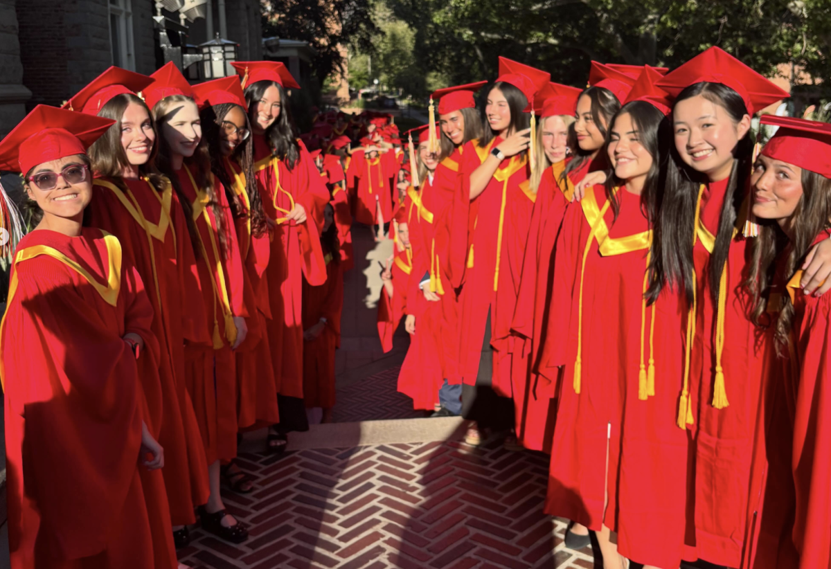 Some of the graduating class of 2026 gather outside the Baccalaureate at the Cathedral of the Madeleine.